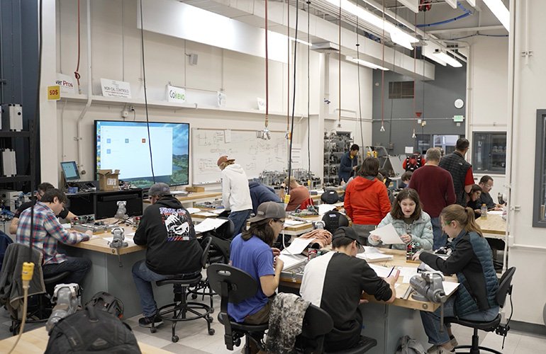 Classroom full of students. Community colleges offer mechatronics programs to train the next generation.
